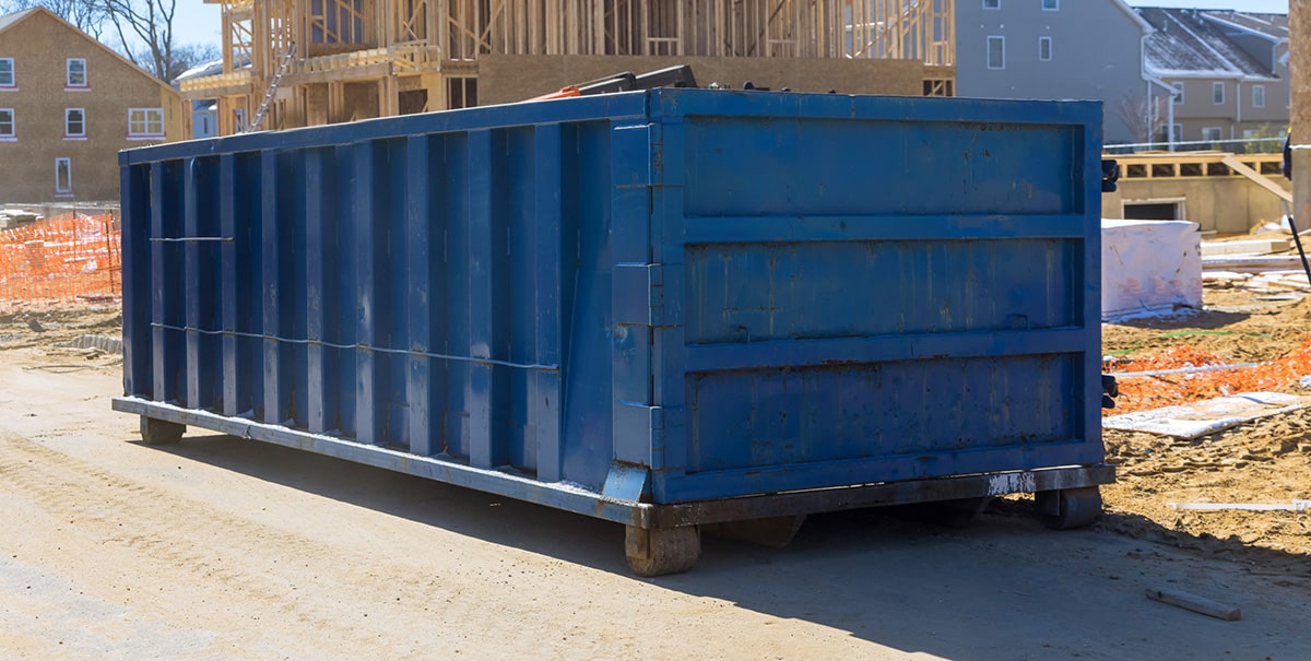 Rental dumpster on a construction site