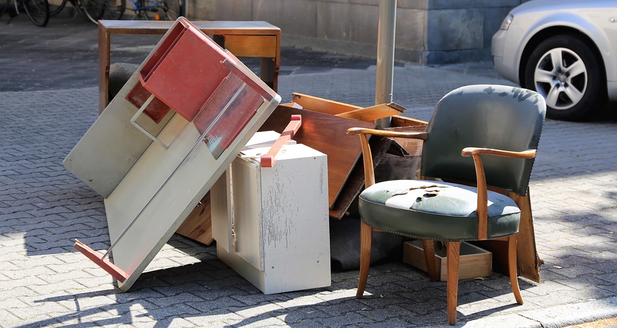 Worn out bulky household items on the curb